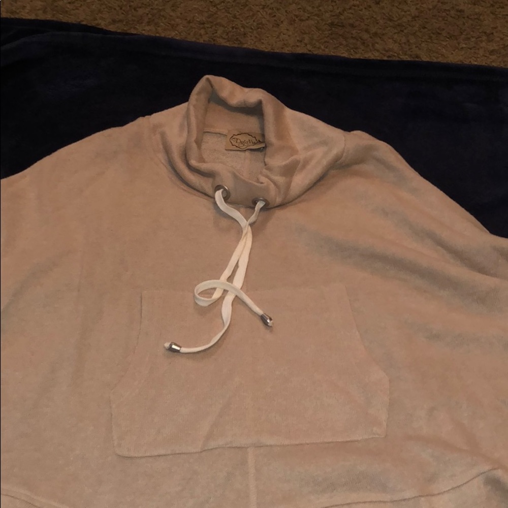 Tan cowl neck poncho/cape.